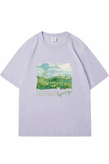 Oversized street tee in lavender with green print.