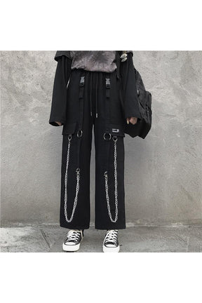 Oversize cargo pants with edgy chain detail.