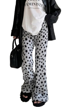 Black Grunge Star Print Flare Pants for women.