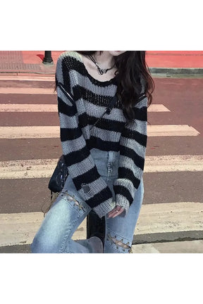 Striped crop sweater in grunge style, no zipper.