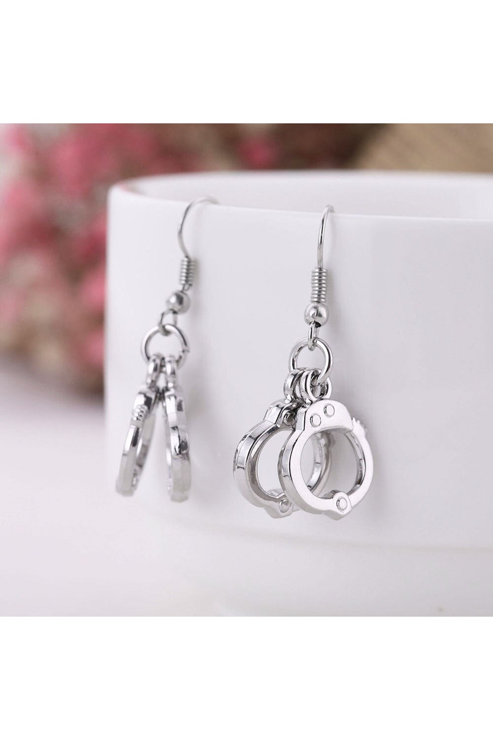 Ethnic party earrings, Handcuffs variant, stylish design.