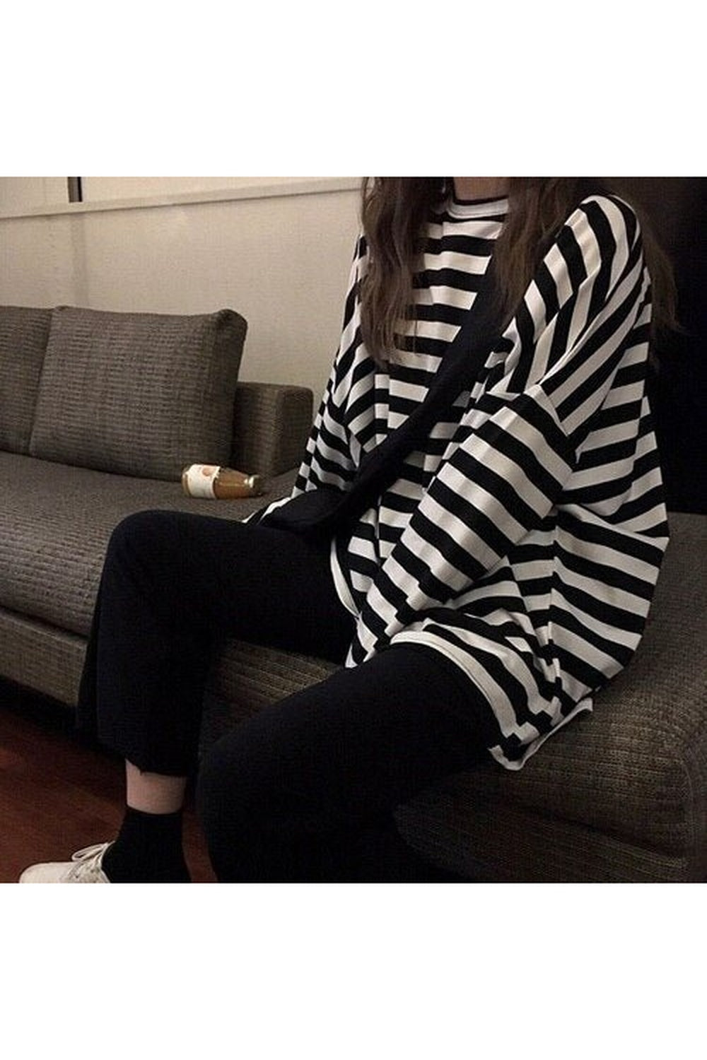 Stylish Harajuku Striped T-shirt featuring vibrant stripes.