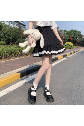 Black Harajuku Summer Ruffle Skirt with flair.