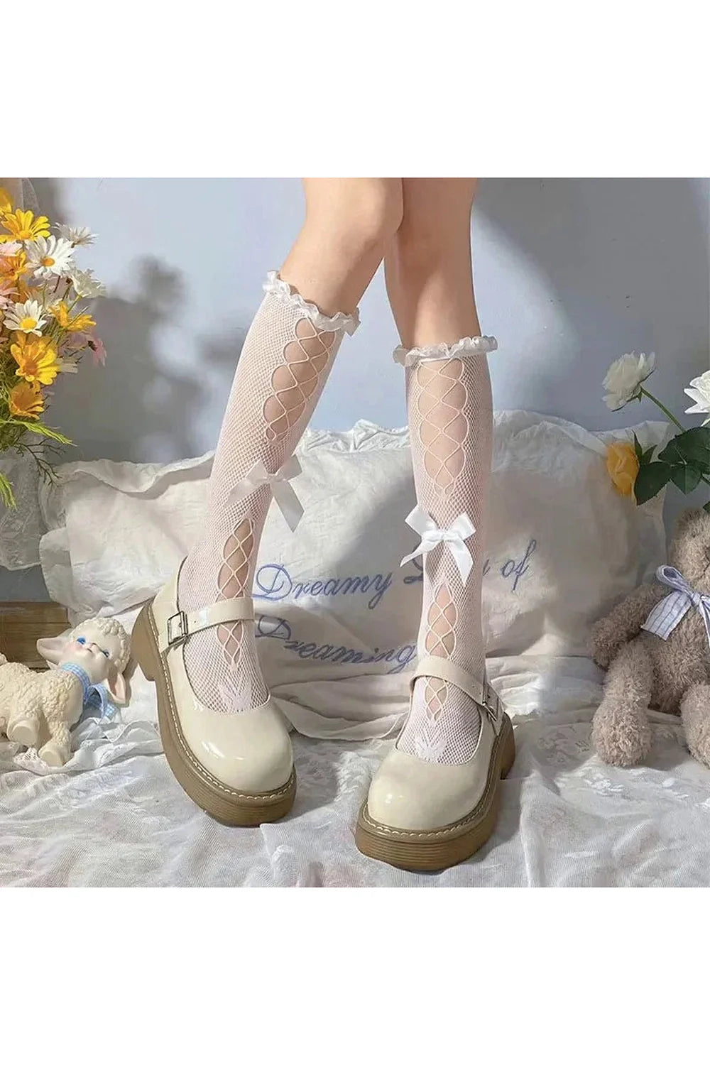 White B Heart Hollow Lace Socks with intricate design.