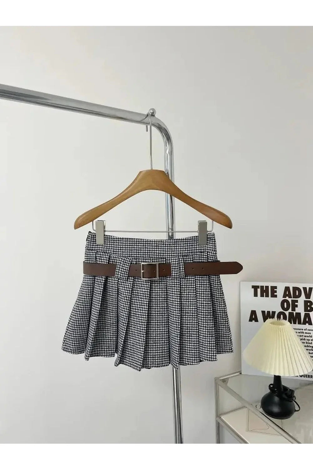 Grey Heritage Houndstooth pleated skirt exudes timeless elegance.