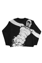 Oversized black Horror Manga Sweater: eerie chic vibe.