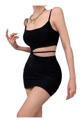 Form-fitting black spaghetti strap mini dress.