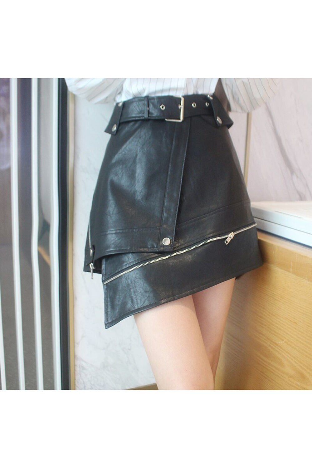 Black Irregular Leather A-line Skirt with edgy design.