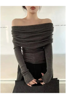 Gray off-shoulder wrap top, elegant and versatile.