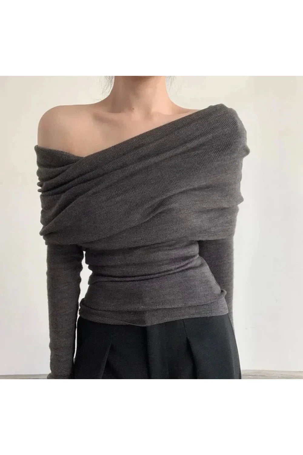 Gray off-shoulder wrap top, elegant and versatile.