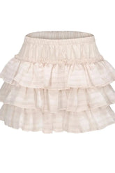 Ruffled pink skirt with apricot accents.