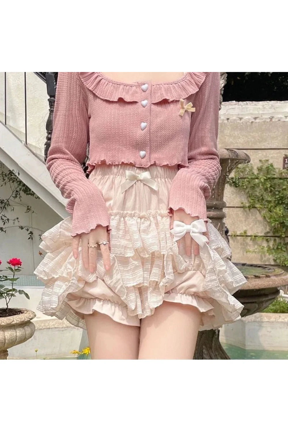 Ruffled pink skirt with apricot accents.