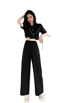 Stylish Korean black sets featuring pants and crop top.