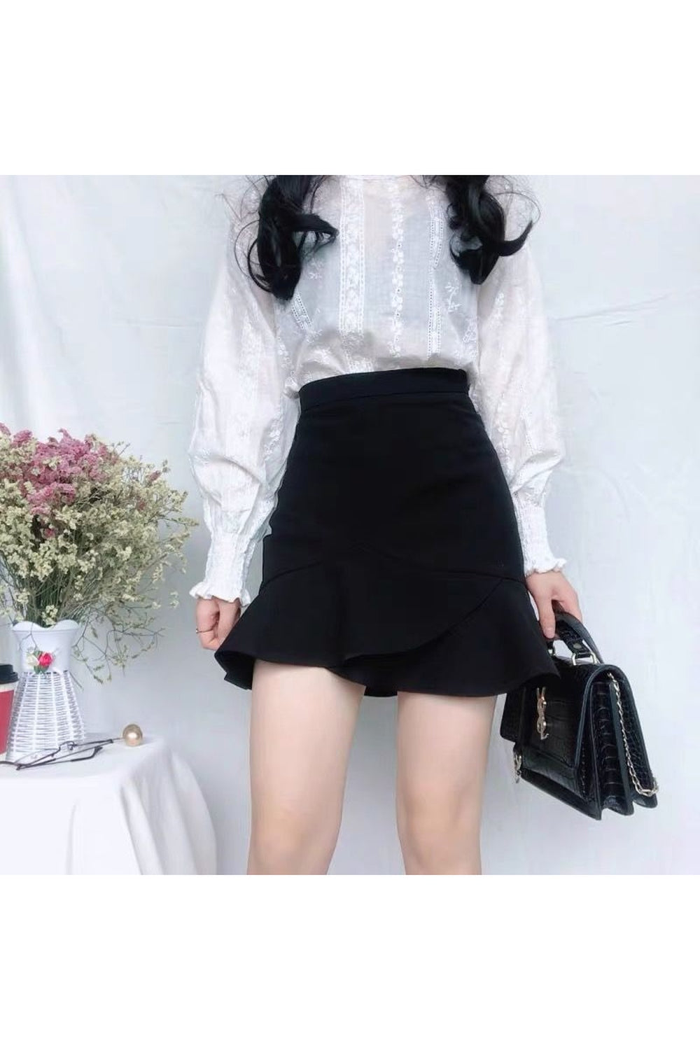 Korean Casual Mini Skirt in black, stylish design.