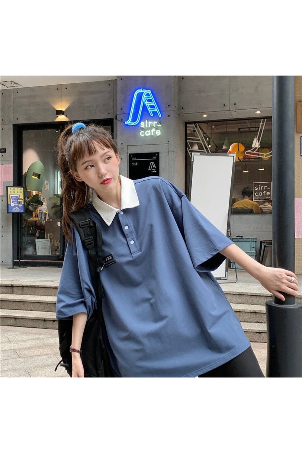 Blue Korean pastel polo tee, casually elegant.