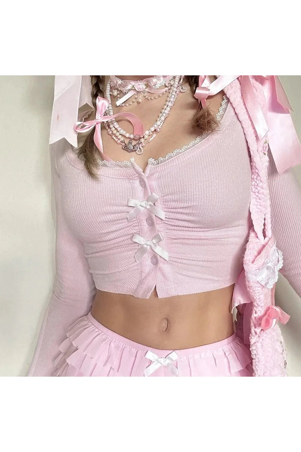 Pink Lace-Trim Bow Tie Crop Cardigan. Feminine and charming.