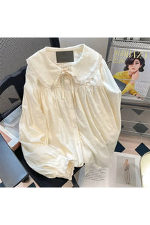 Elegant Lace Whisper Bow-Tie Blouse in apricot.