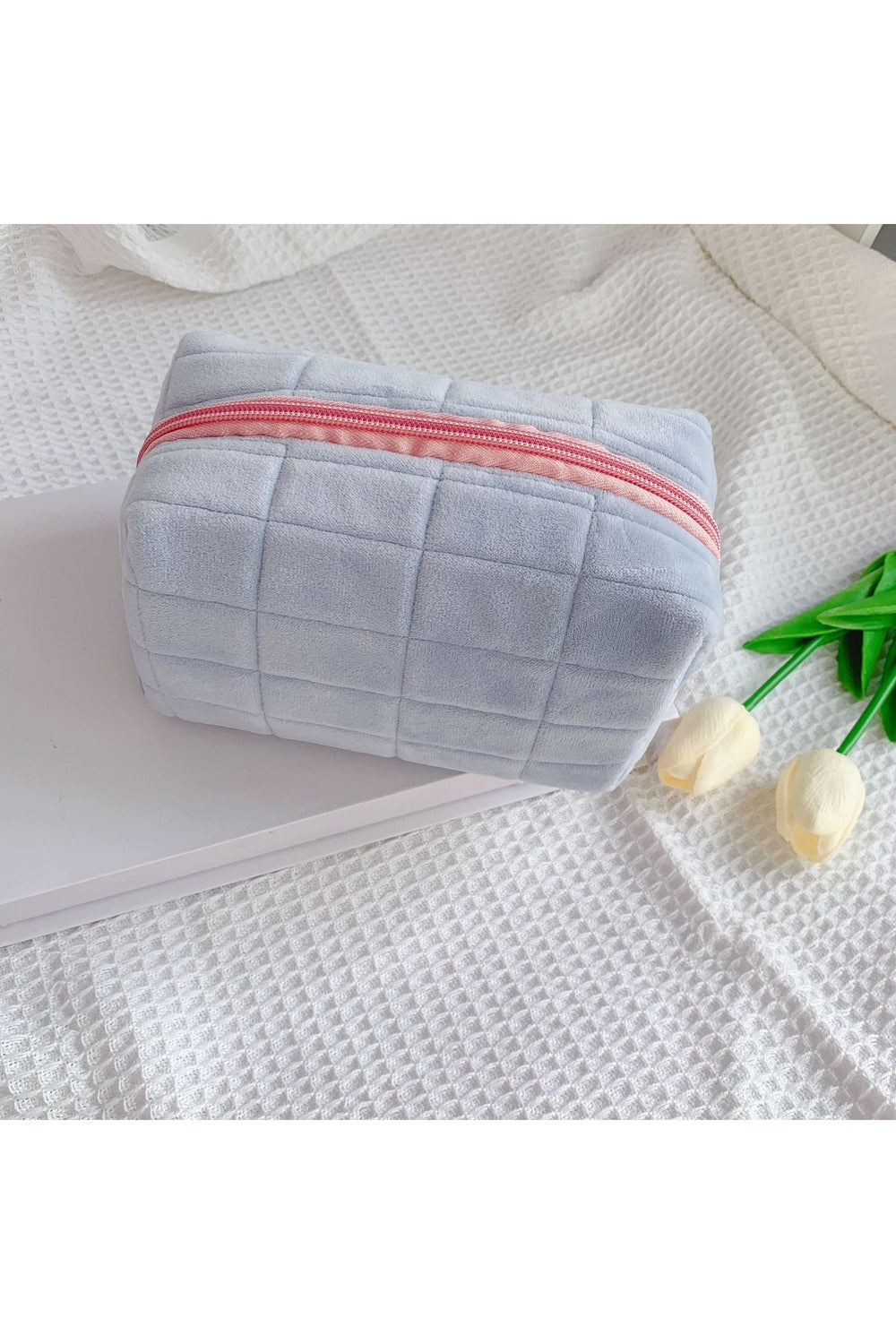 Spacious "Large Capacity Travel Plush Makeup Bag" in grid blue.