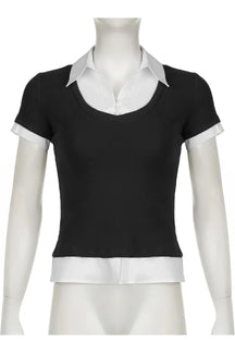 Stylish black layered collared top with contrast detailing.