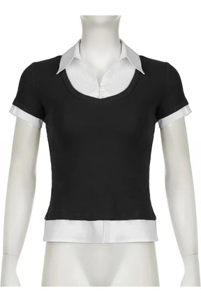 Stylish black layered collared top with contrast detailing.