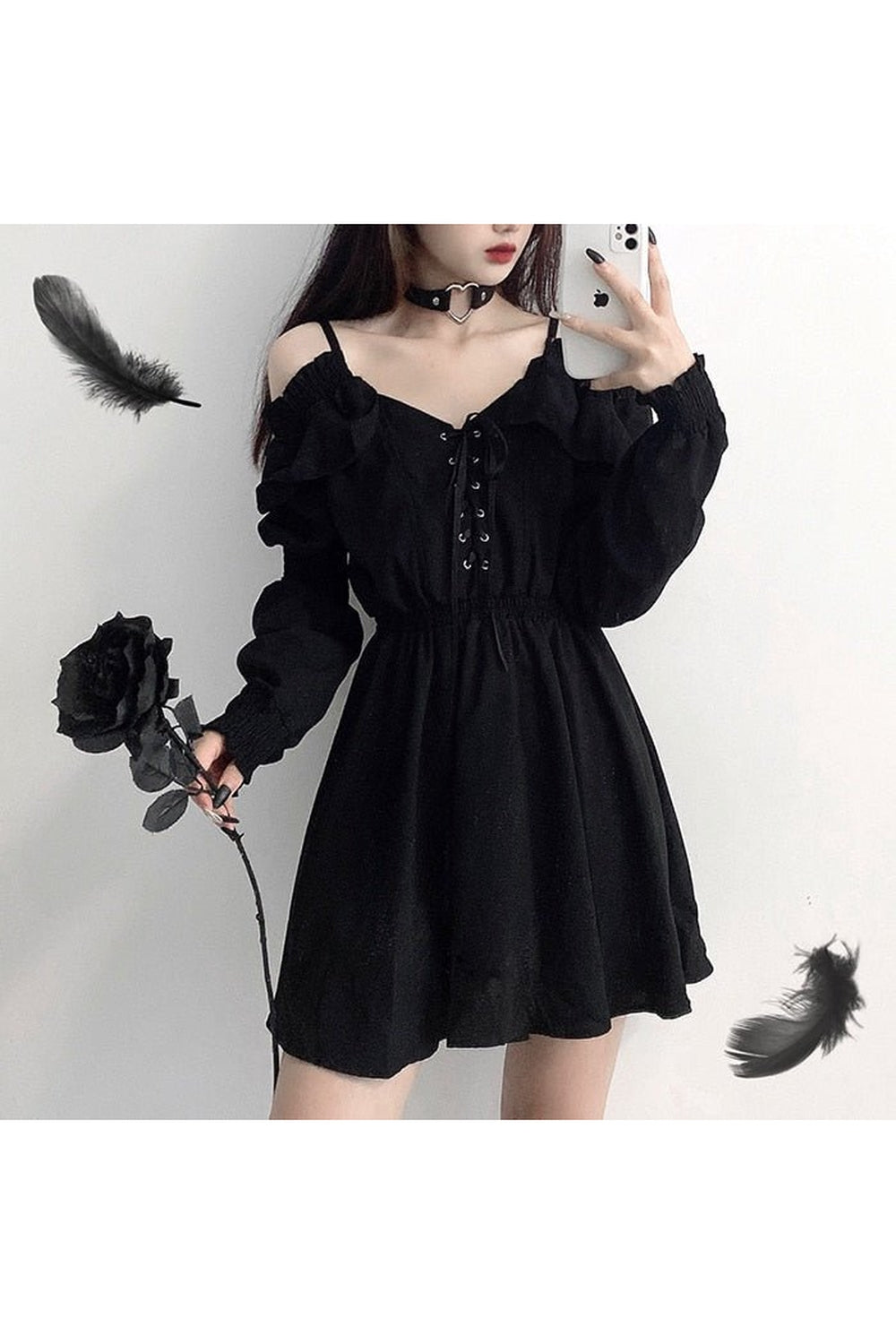 Black long sleeve gothic dress with elegance.