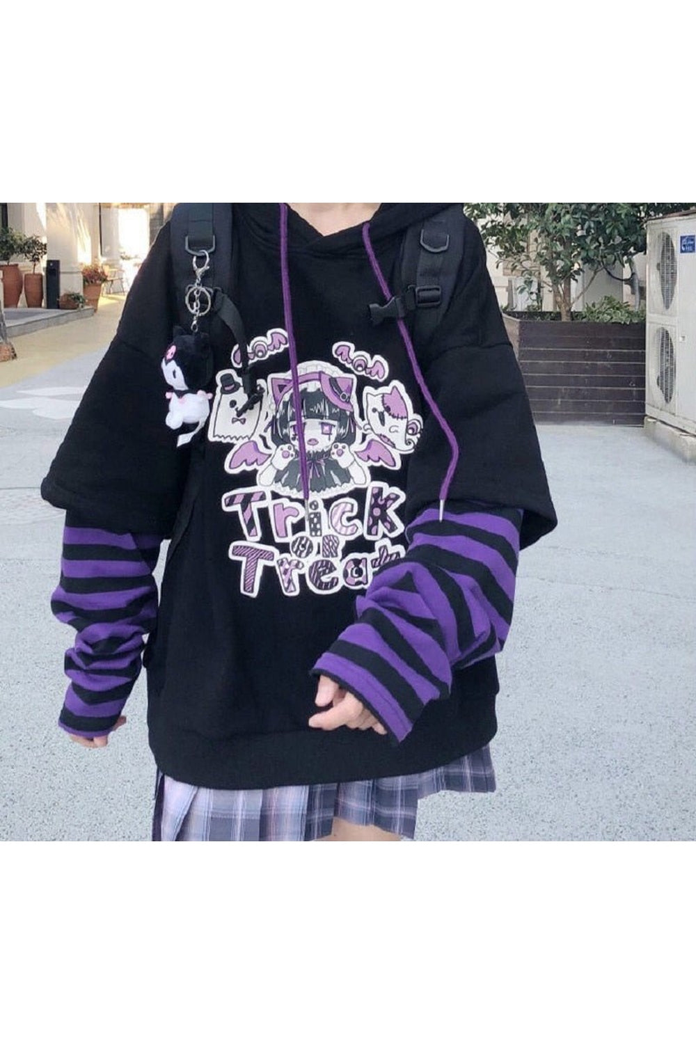 Cozy black anime hoodie for fall season.