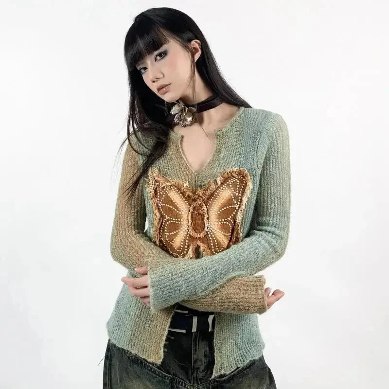 Green Mystic Wing Top with enchanting design.