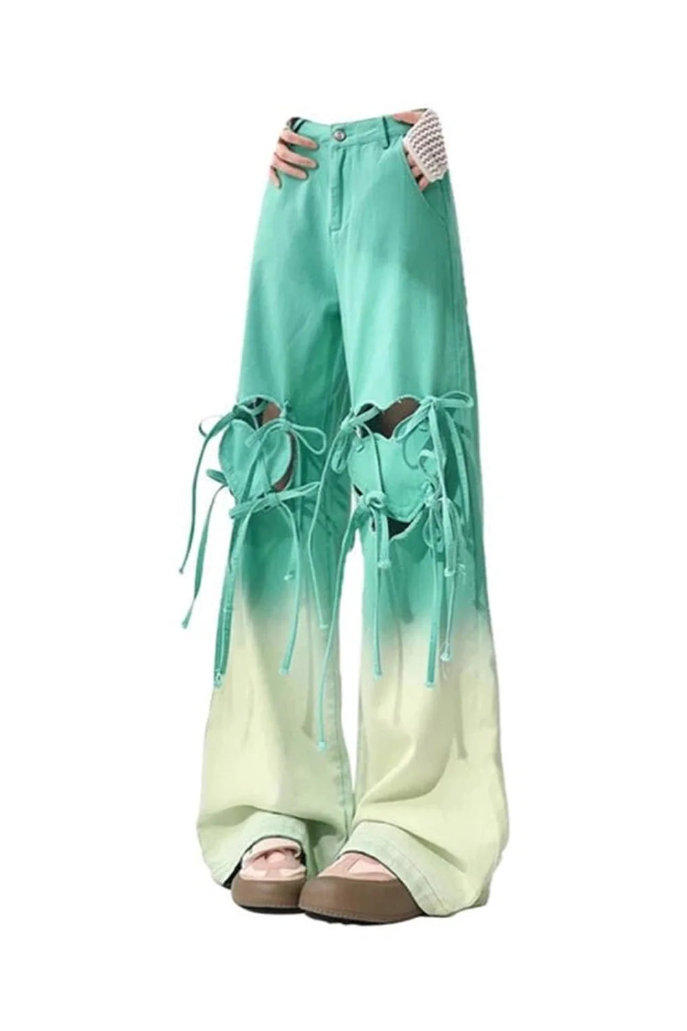 Ombre Cutout Lace-Up Pants in Green with unique detailing.