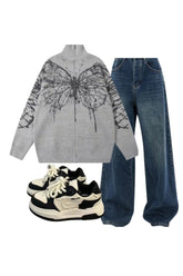 Y2k Outfit: Oversized jeans, butterfly sweater, pastel sneakers.