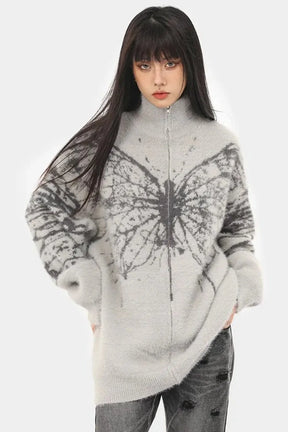 Cozy Gray oversized sweater with butterfly design.