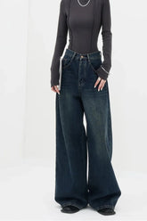 Oversized dark wash wide-leg jeans in Deep Blue.