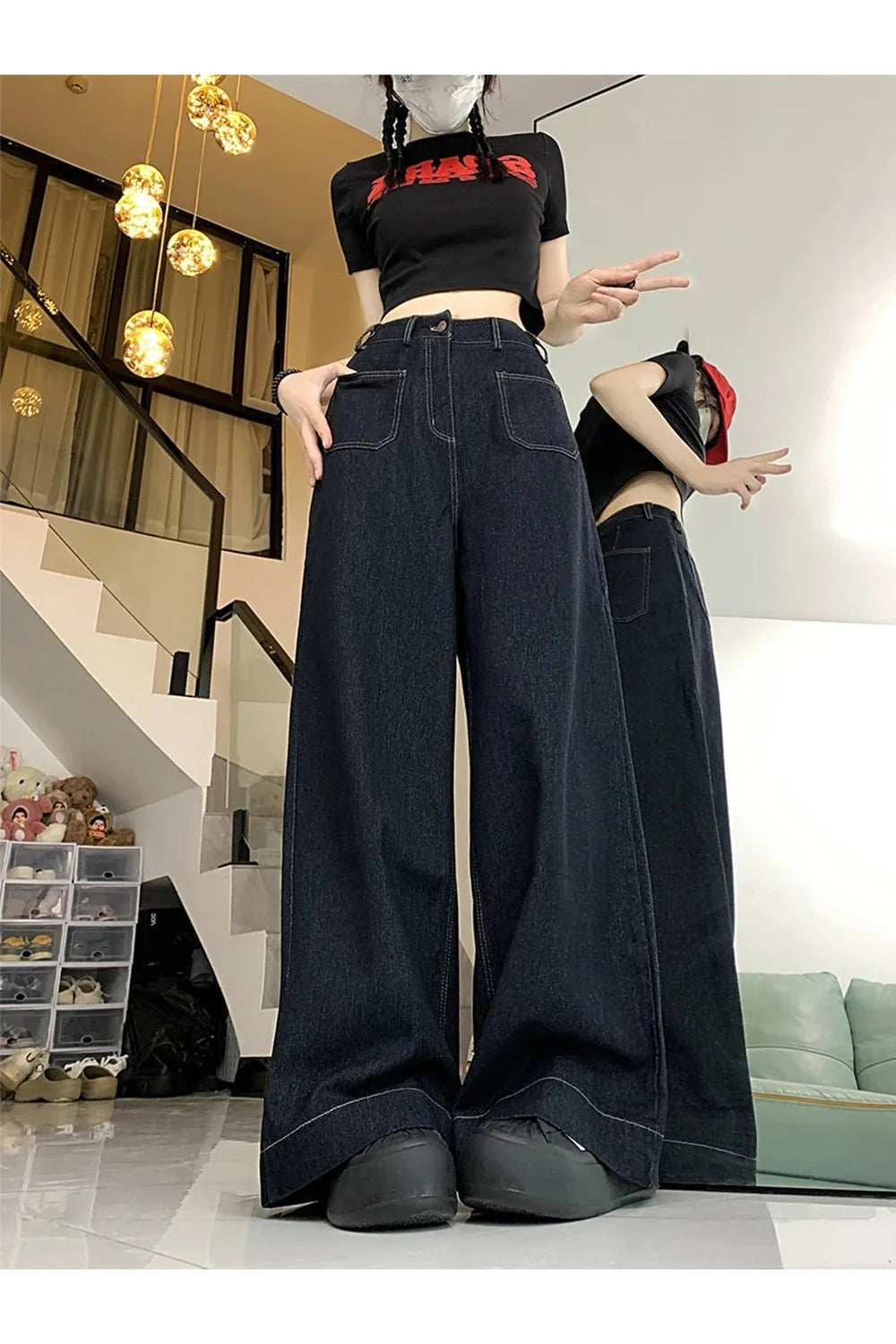 Oversized denim palazzo pants in elegant blue hue.