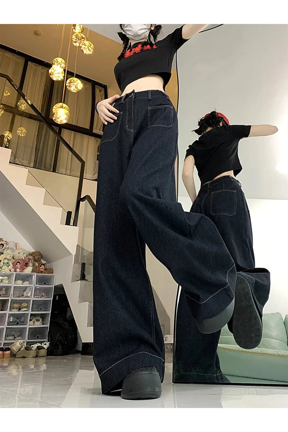 Oversized denim palazzo pants in elegant blue hue.