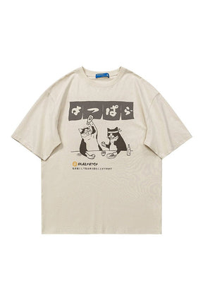 Beige Oversized Drinking Cat T-shirt, playful design.