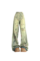 Wide-leg jeans splattered with fall paint in picture color.