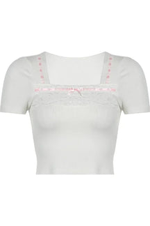 White Pastel Dream Lace Trim Top exudes elegance.