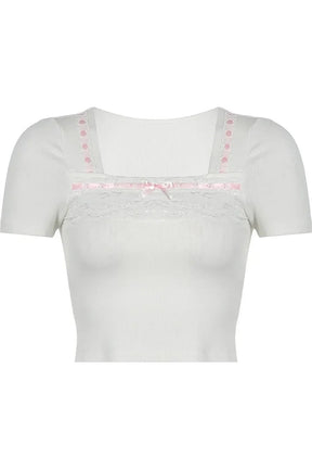 White Pastel Dream Lace Trim Top exudes elegance.