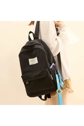 Pastel Simple Design Oxford Backpack in black small size.