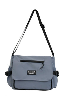 Blue patchwork crossbody messenger bag. Trendy and stylish.