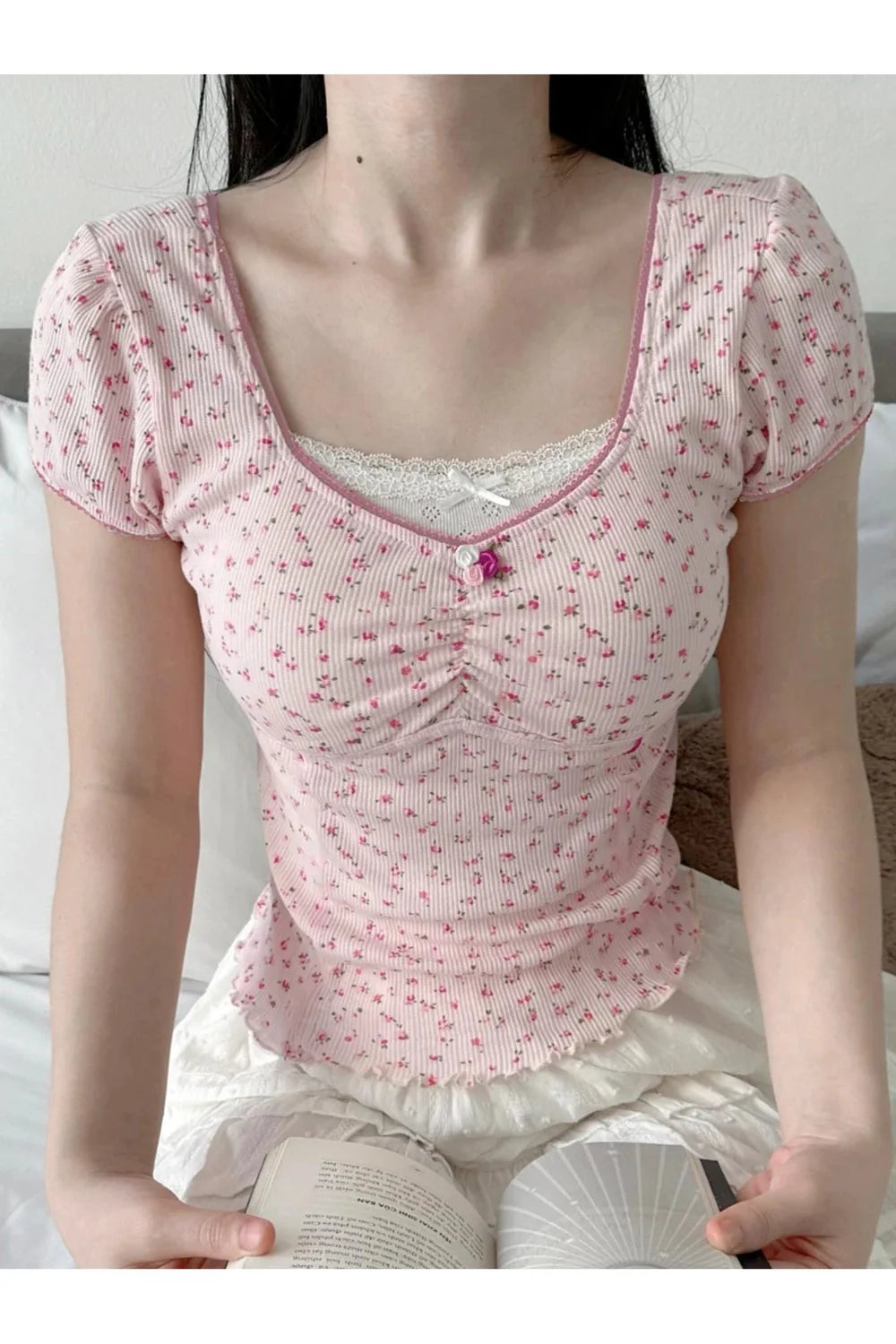 Pink Petite Rosebud Top features delicate rose details.