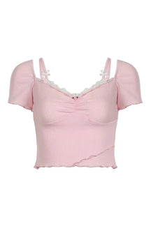 Crop top in Pink with lace bow trim.