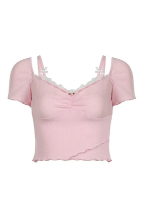 Crop top in Pink with lace bow trim.