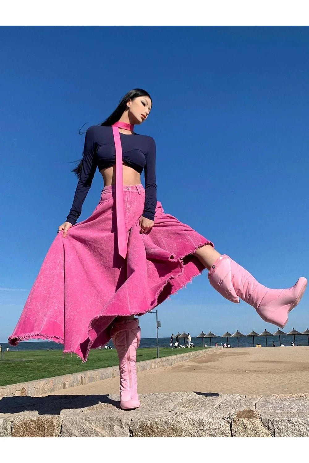 Pink tie dye denim skirt, pleated style.