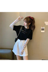 Black Preppy Long Sleeve Heart T-shirt with stylish design.