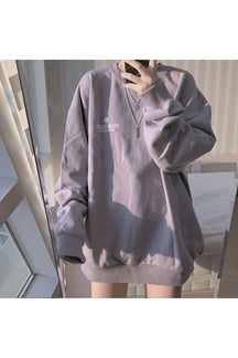 Cozy purple pastel loose sweatshirt in aesthetic style.