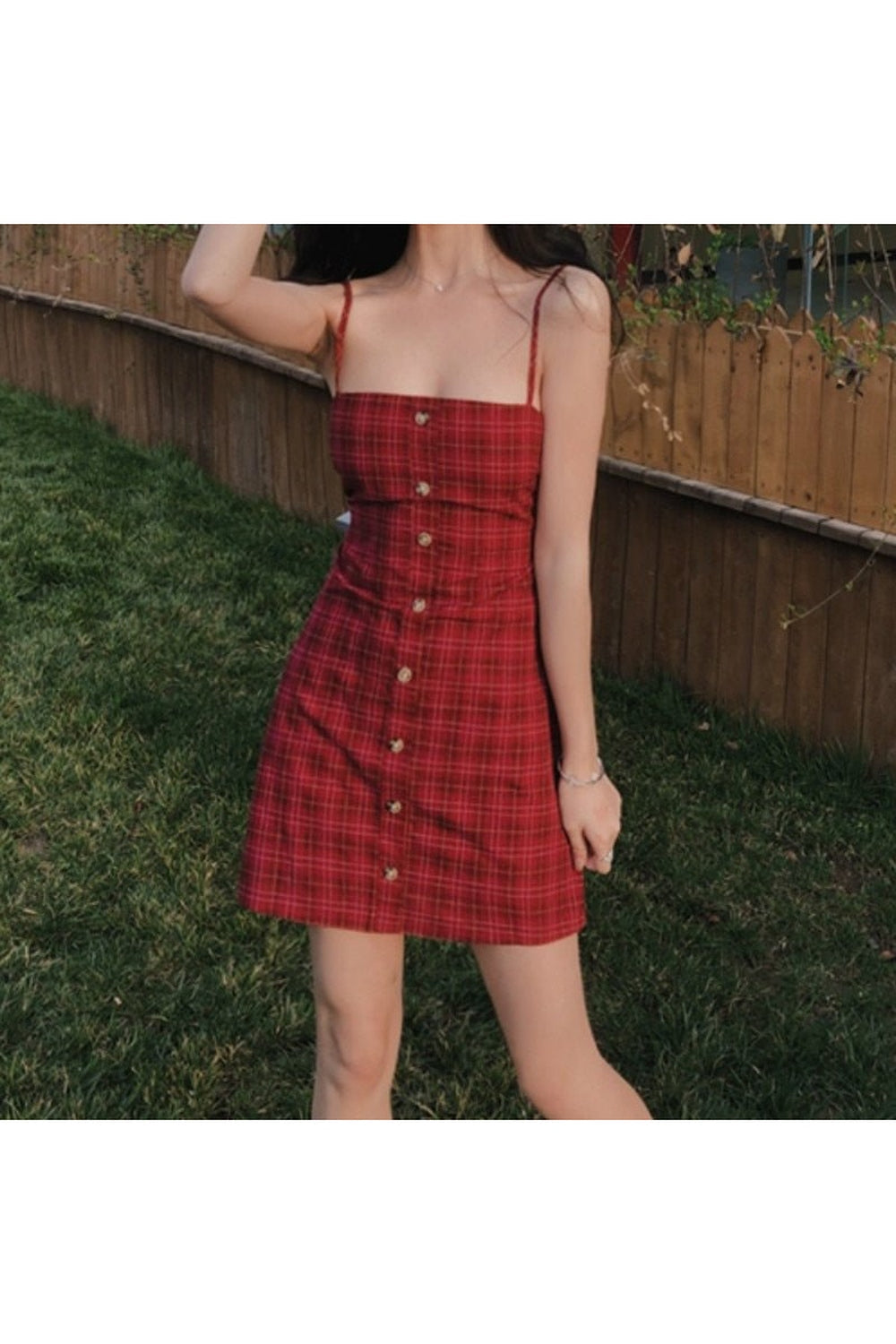 Red plaid retro dress in vibrant red hue.