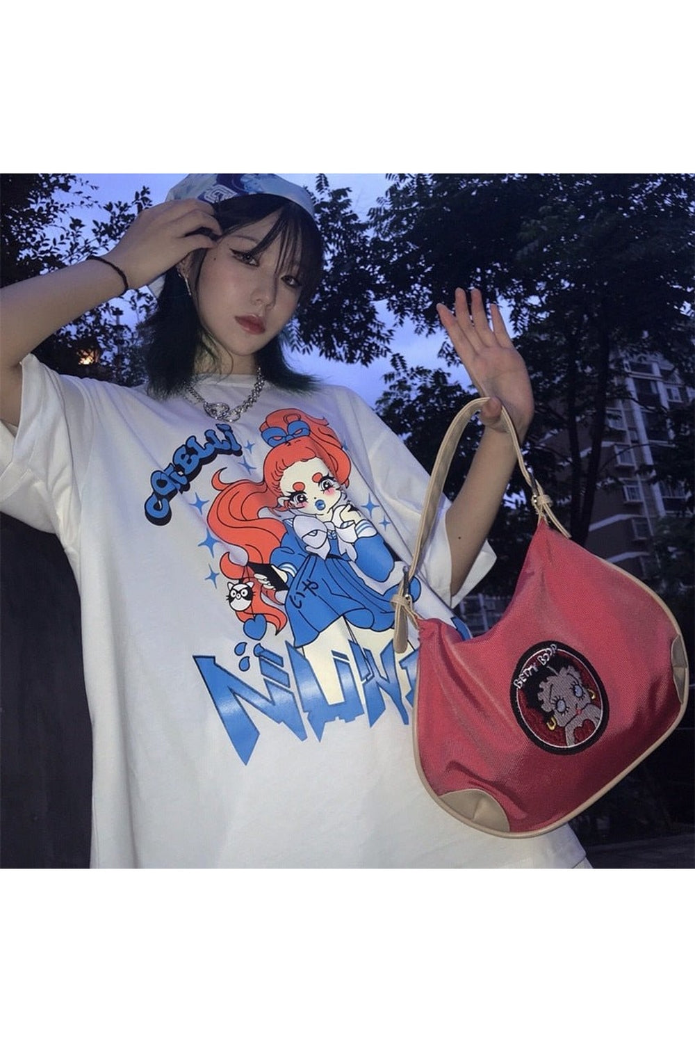 Vintage-style handbag with retro cartoon design.