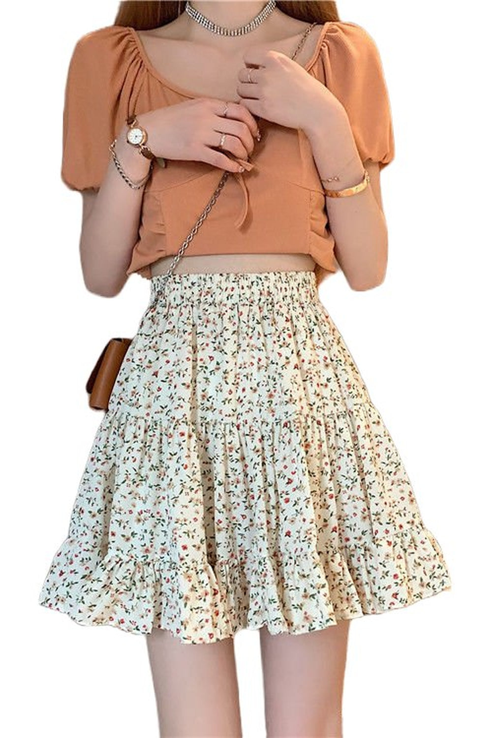 Vintage-inspired apricot ruffles skirt for a feminine look.