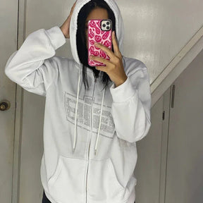 White Rhinestone Logo Zip-Up Hoodie with sparkle.