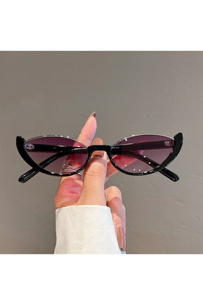 Chic rimless cat eye sunglasses in black-gradient purple.